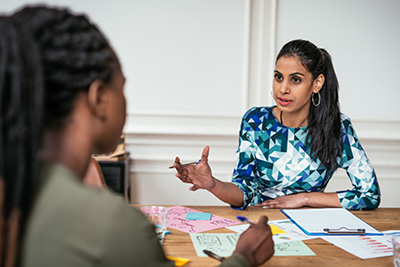 Advisor talking to client